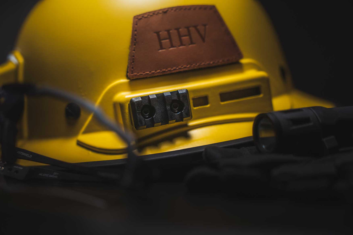 3 slot Mapul Picatinny Rail adapter on a yellow kevy hard hat.