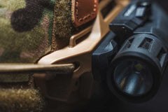 3 slot Mapul Picatinny Rail adapter on a balistic helmet with a light mounted.